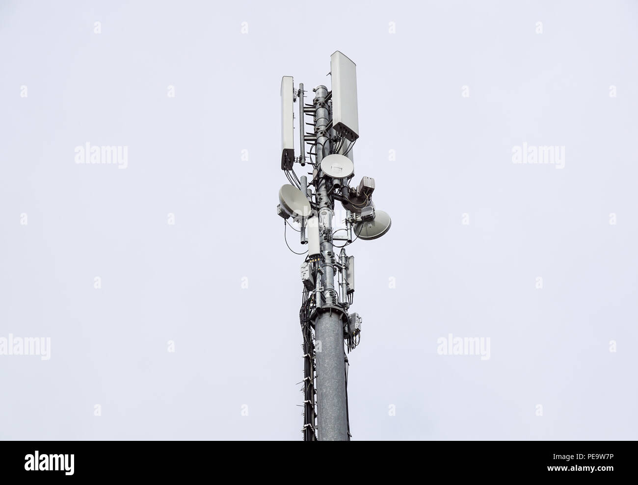 Technology on the top of the telecommunication GSM. Masts for mobile phone signal. Tower with antennas of cellular communication . Stock Photo