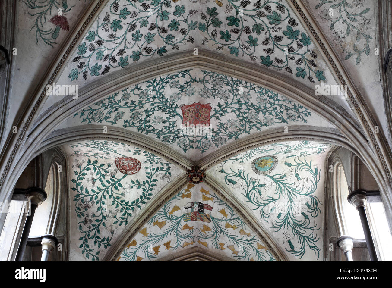 The ceiling of the Church of St Mary and St Blaise, Boxgrove, West Sussex. Foliage and heraldry painted in the mid-16C by Lambert Bernard. Stock Photo