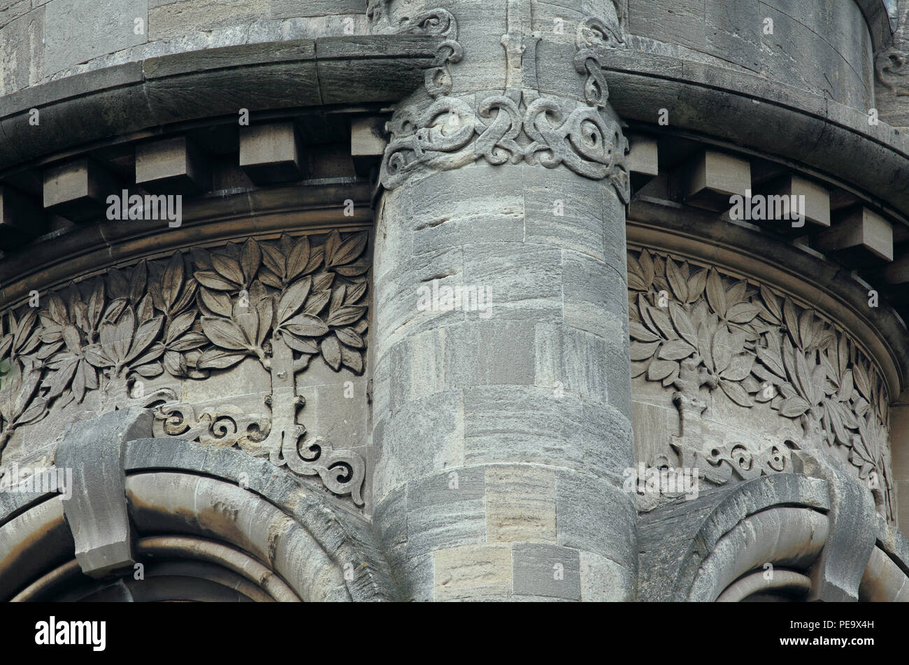 Close up of the stonework details on the clock tower of the Horniman Museum, Forest Hill, South London - a rare example of English Art Nouveau. Stock Photo