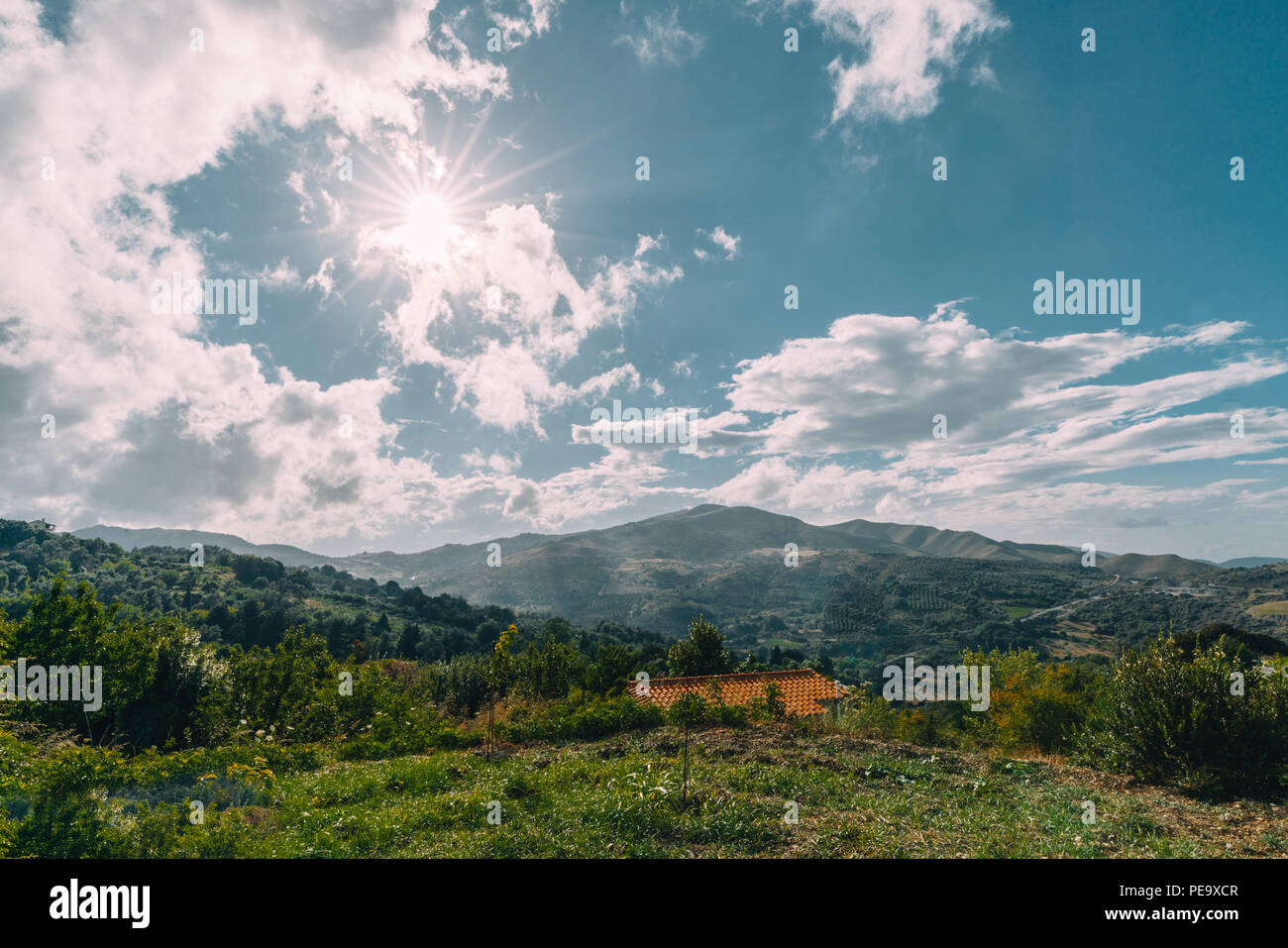 Crete Greece, View on mountains with low hanging clouds and blue ...