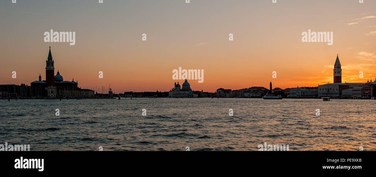 venice at sunset with reflections in the sea Stock Photo - Alamy