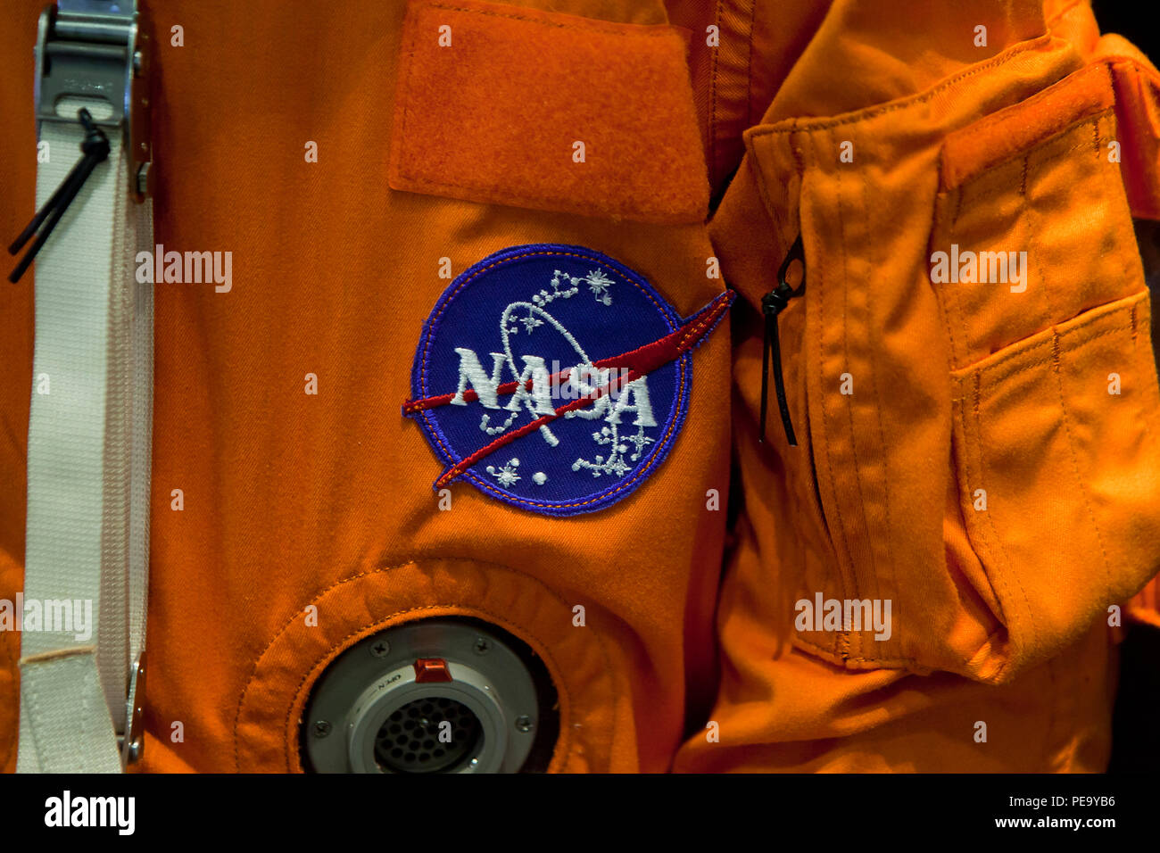NASA patch on Advanced Crew Escape Suit (ACES, pumpkin suit) - USA Stock Photo