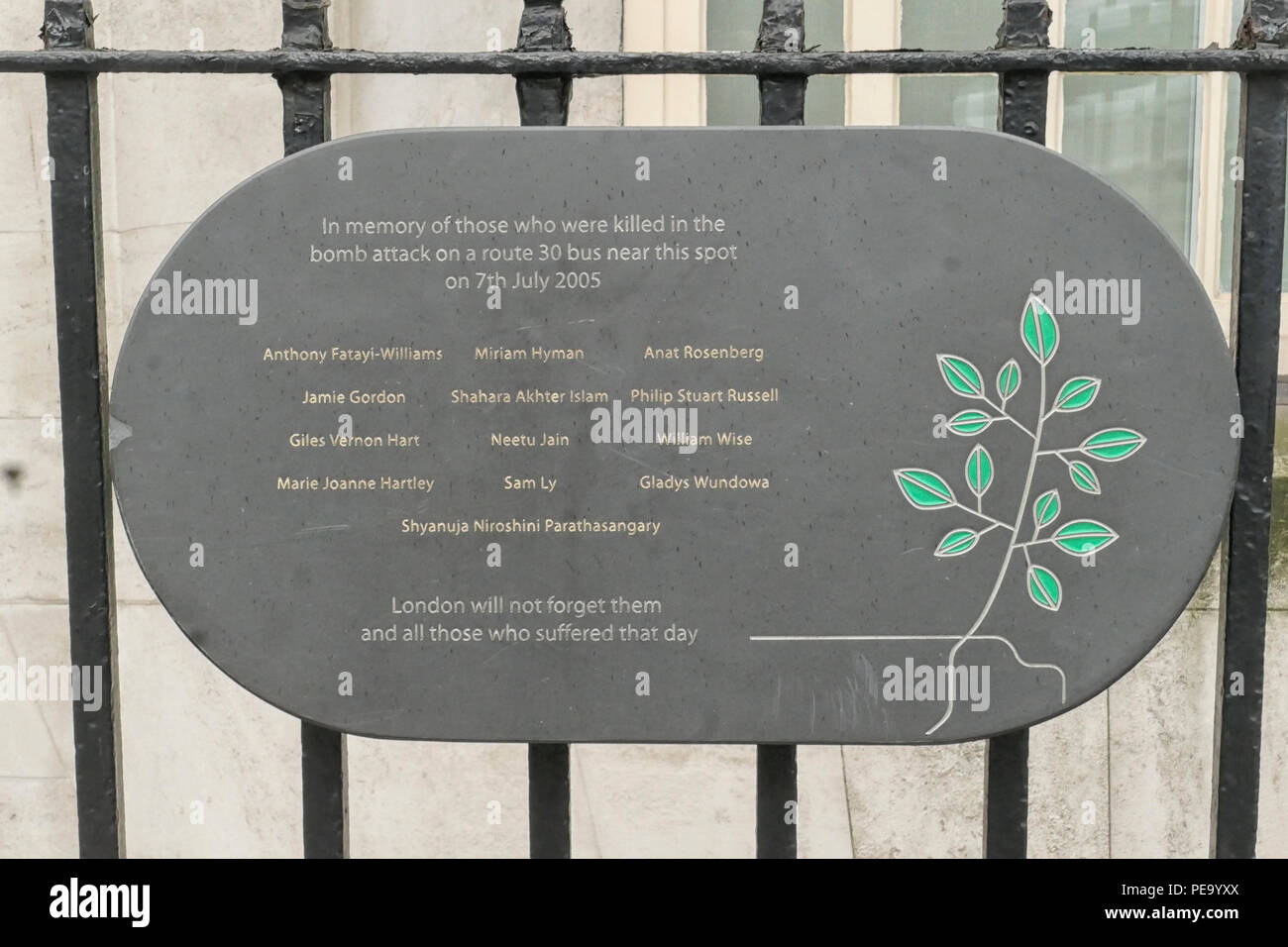 A plaque on railings in Tavistock Square in memory of those killed in the 7th July 2005 terrorist attack on a London bus. Stock Photo