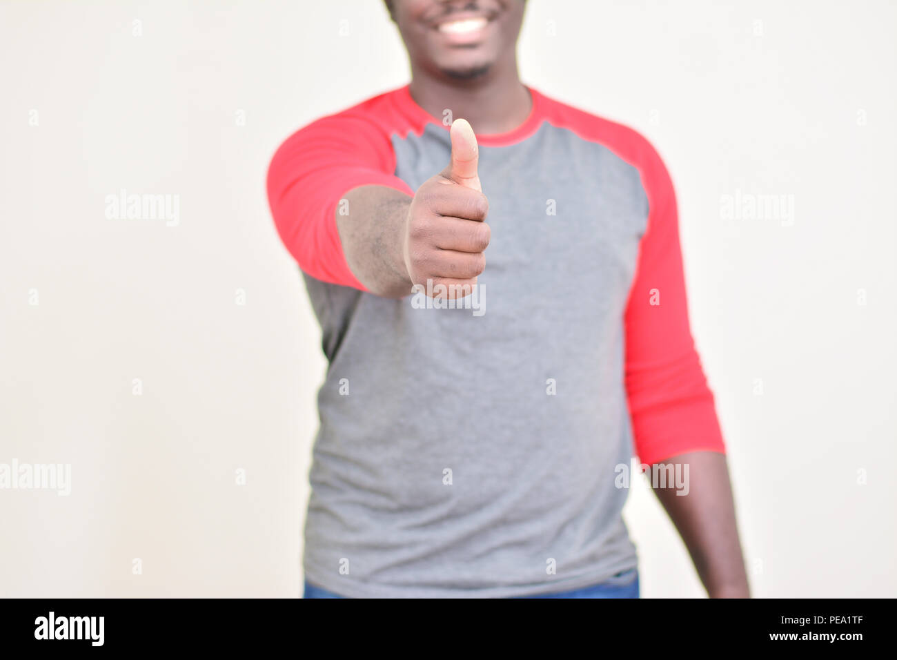Black male, thumbs up Stock Photo - Alamy