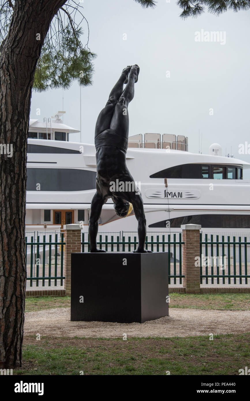 The Golden Mean, a hyper-realistic sculpture by Carole A Feuerman exhibited at the Venice Biennial open air exhibition in Venice, 2017 Stock Photo