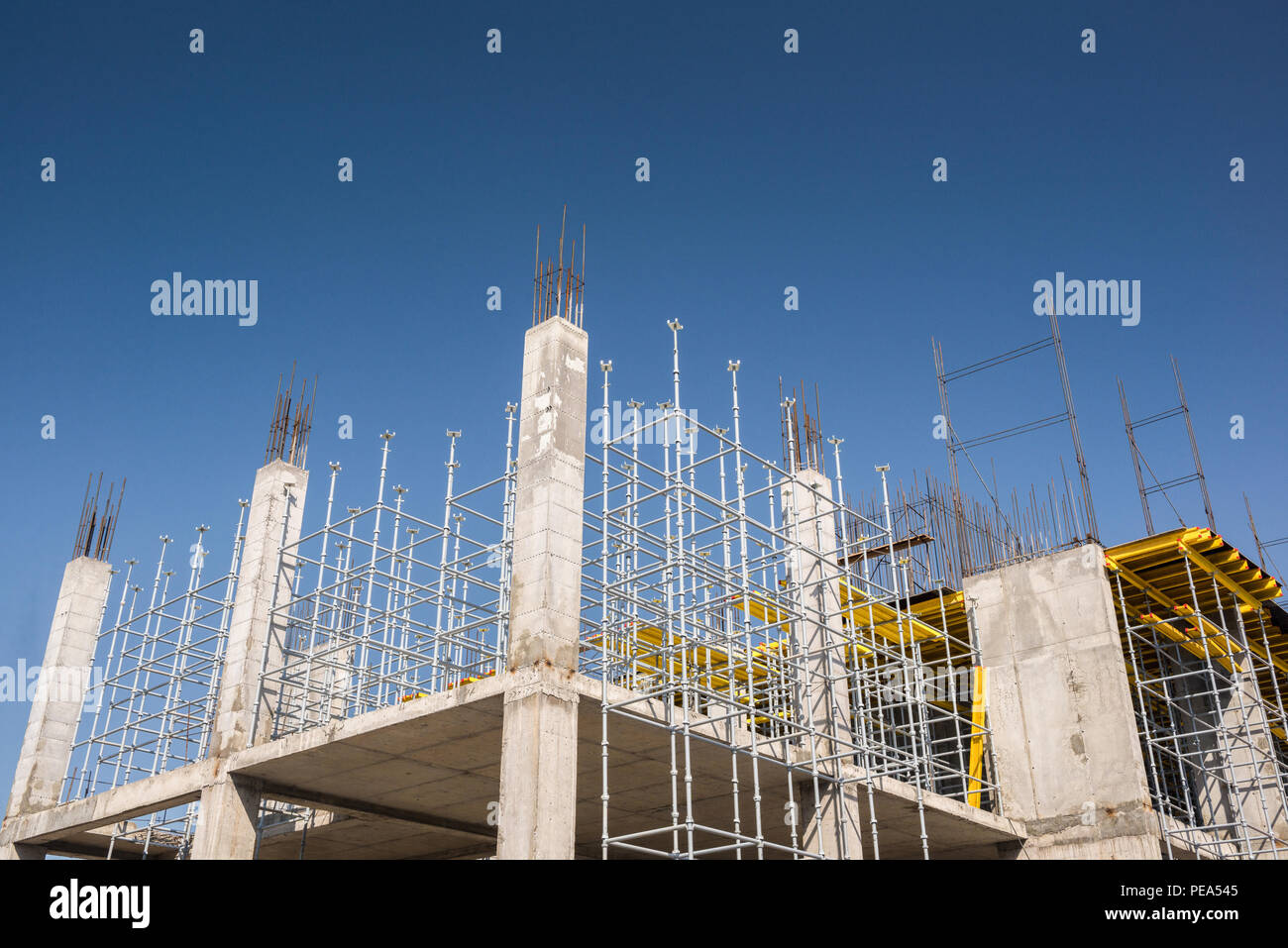metal concrete structures of the building under construction. scaffolding and supports. bottom view Stock Photo
