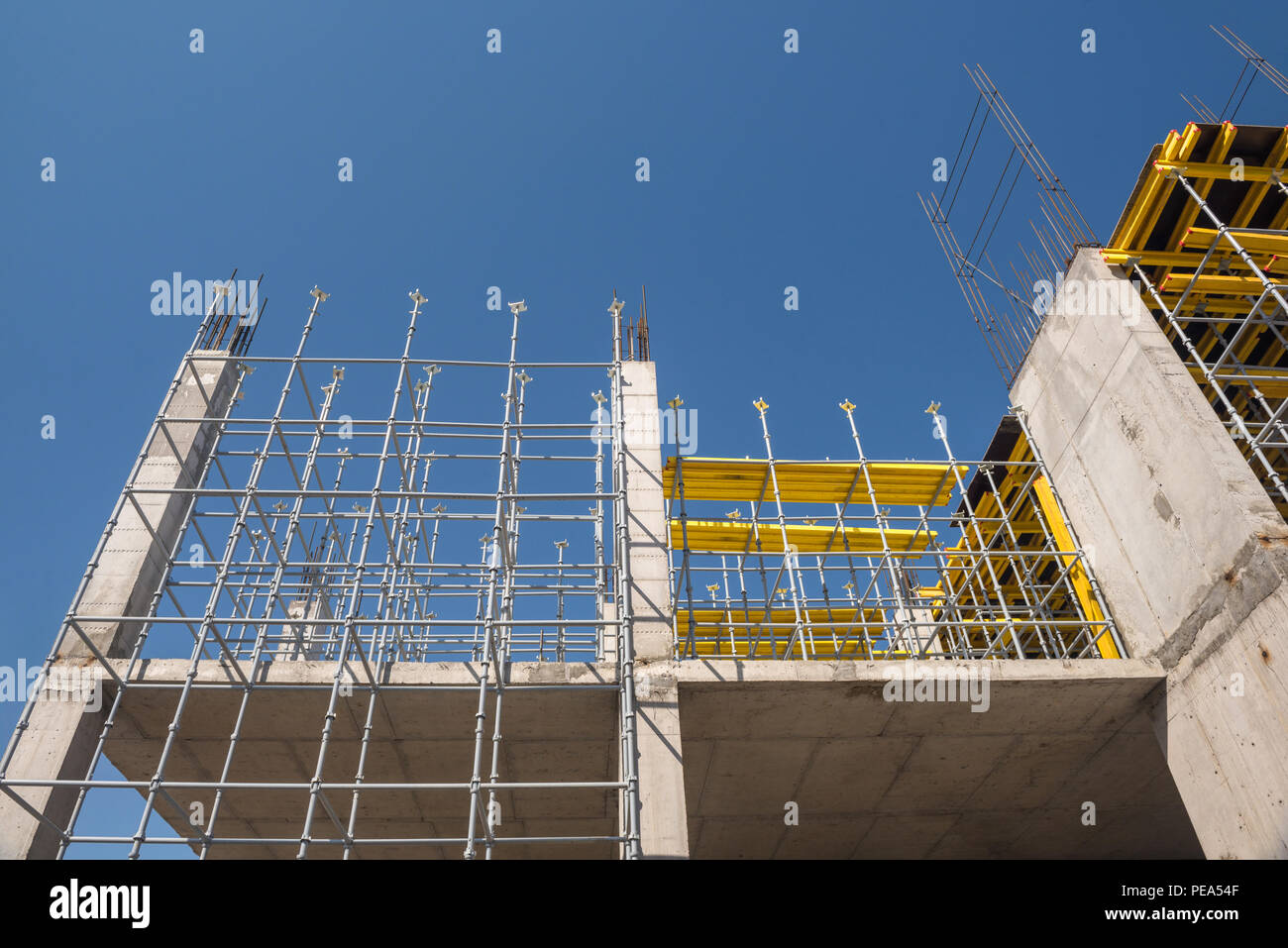 metal concrete structures of the building under construction. scaffolding and supports. bottom view Stock Photo