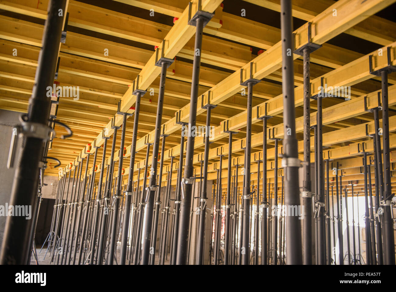 metal and wood scaffolding and supports, construction equipment Stock