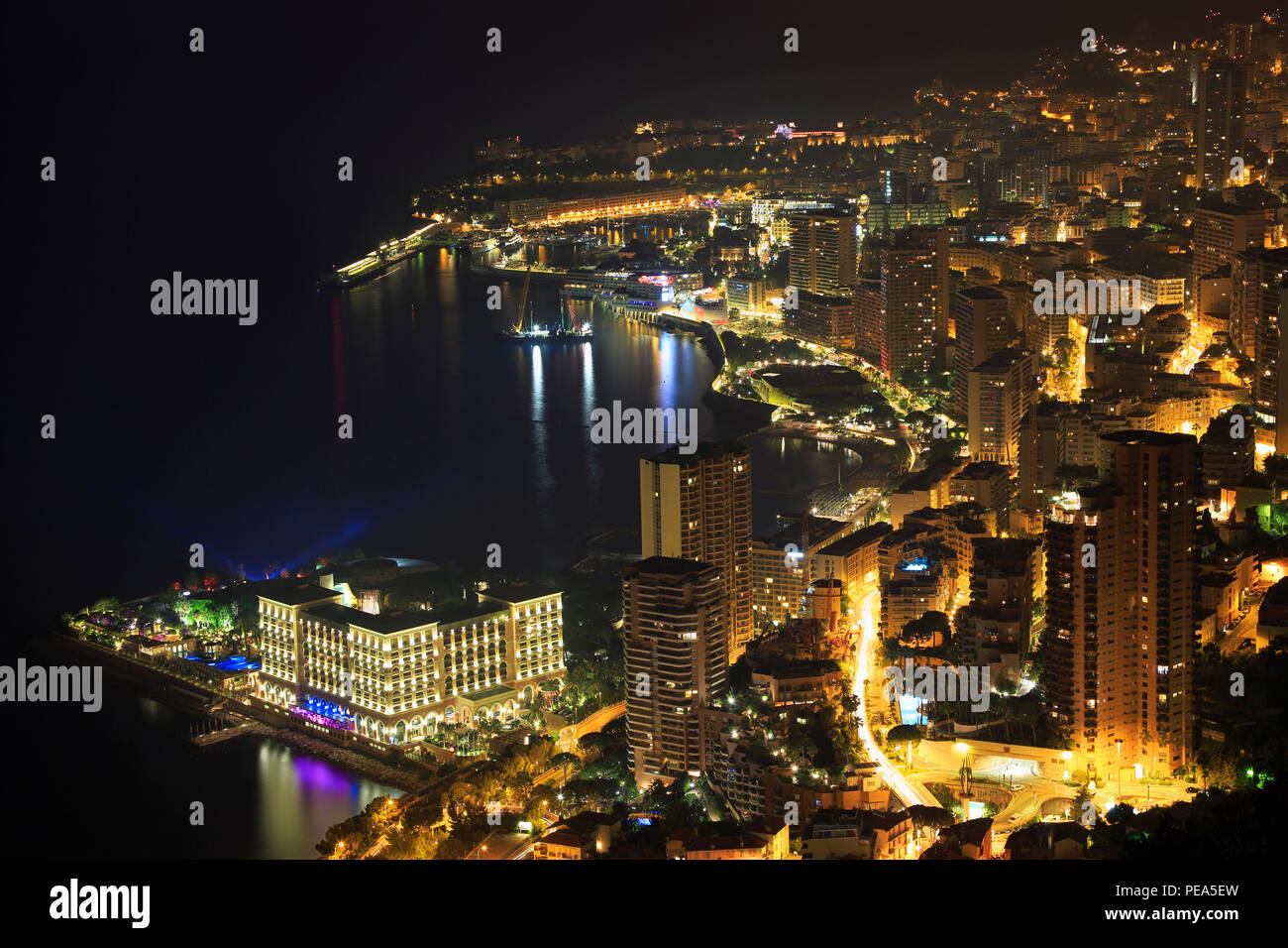 Monte Carlo illuminated at night in Monaco, Europe Stock Photo