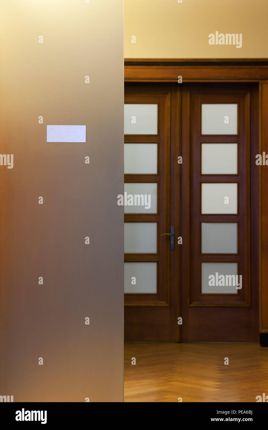 Wooden Door With Glass And Plate In A Respectable Office With