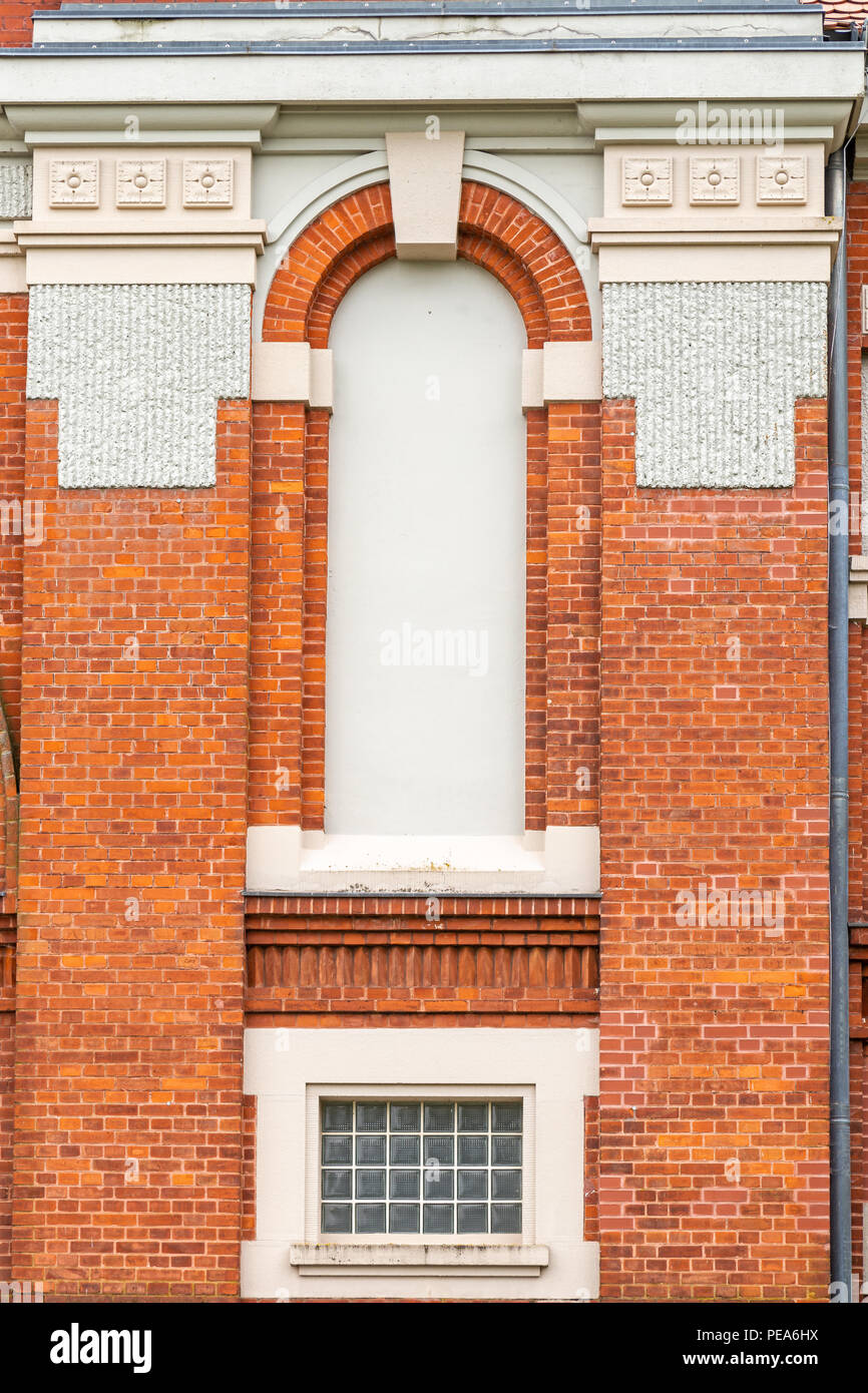 Brick facade of a renovated industrial building Stock Photo
