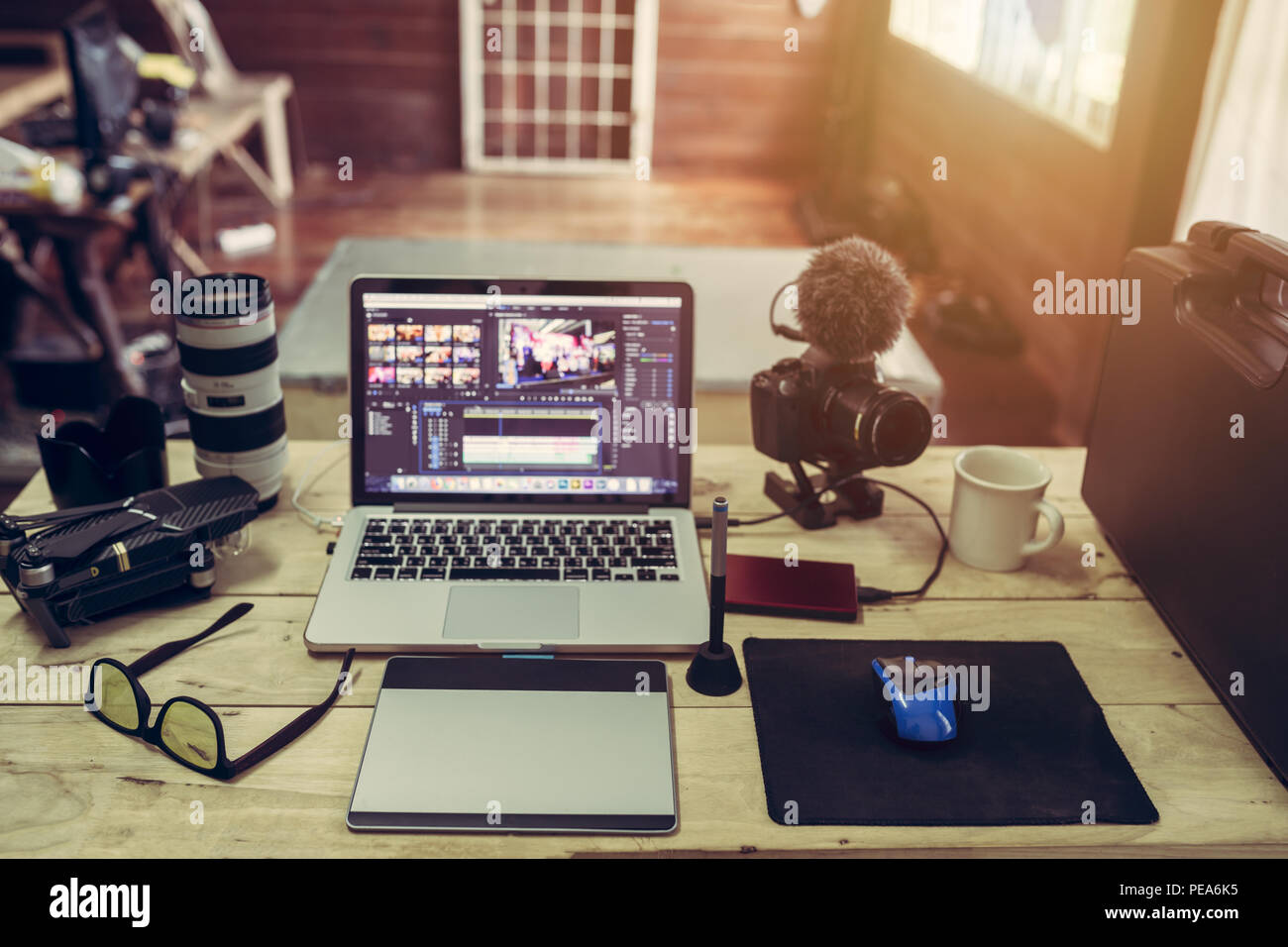 The laptop Camera and drone gear for editor man or freelance Vlogger Stock Photo
