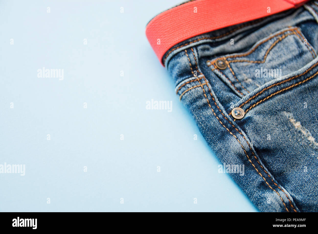 red strap jeans