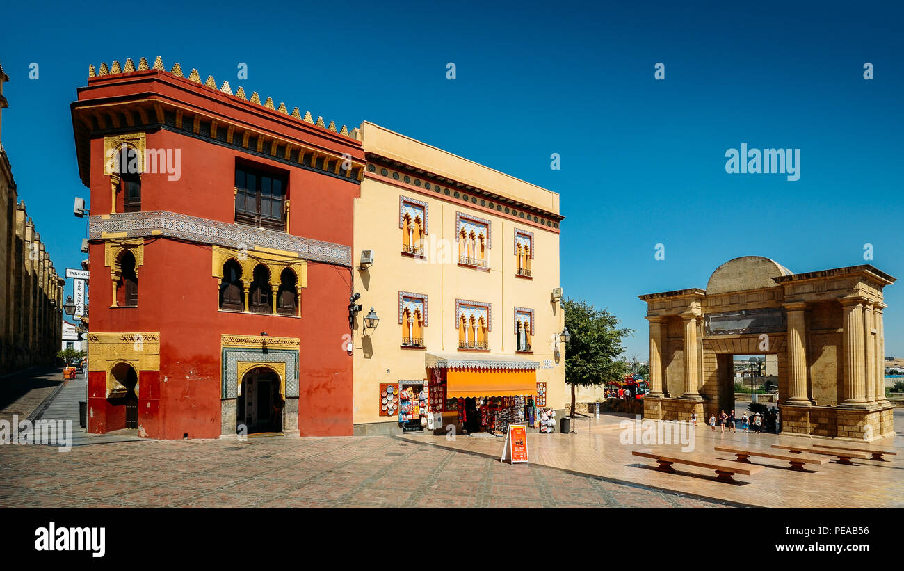 Cordoba, Spain - July 13, 2018: Traditional Analucian architecture with the Triumphal arch, Cordoba, Andalucia Spain Stock Photo