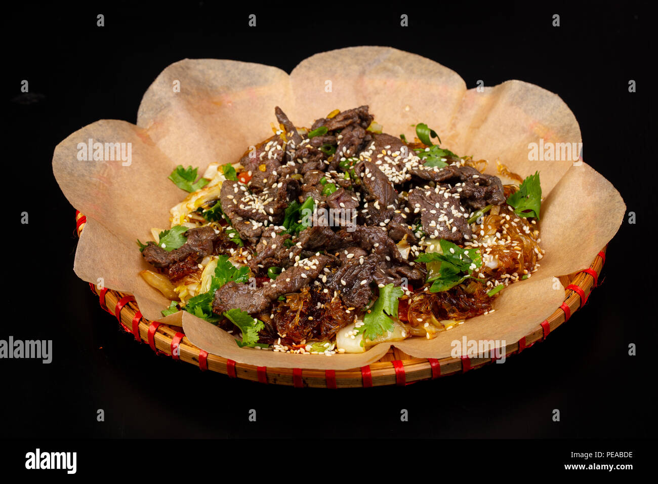 Asian cuisine - Fried glass noodle with beef Stock Photo