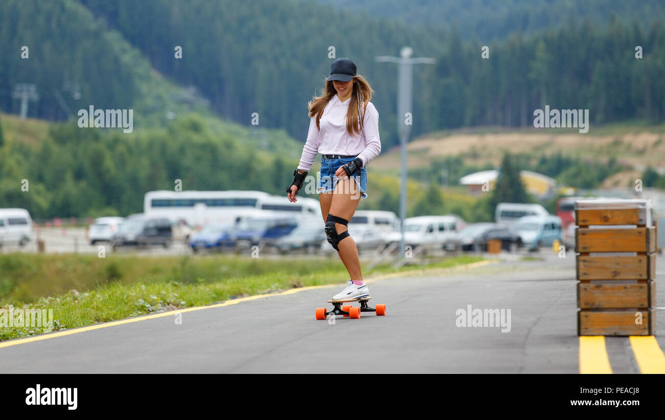 Young downhill the road Stock Photo - Alamy