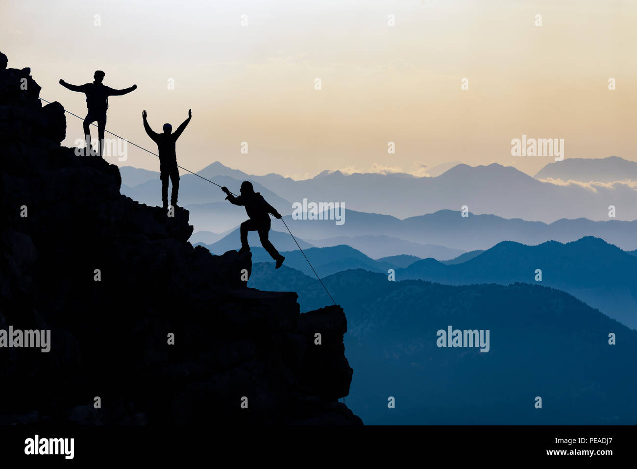challenging mountains and success concept Stock Photo