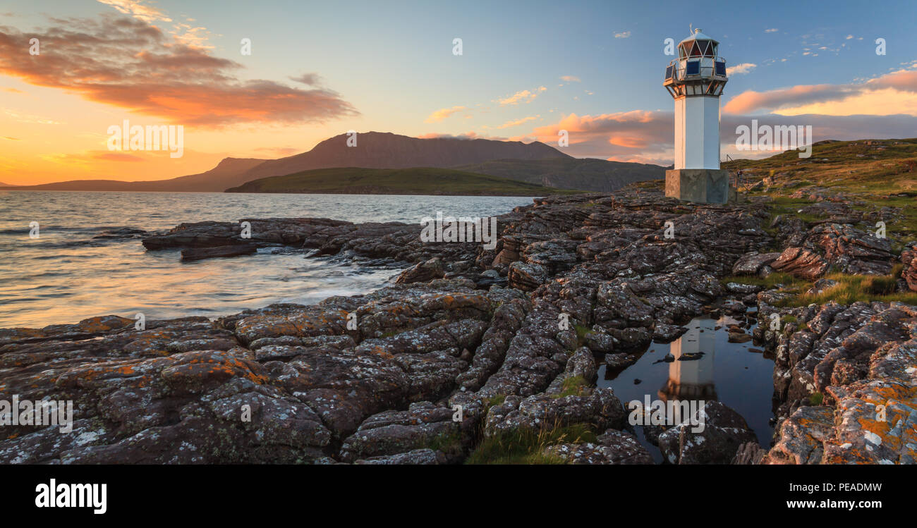 Rhue Lighthouse, Ullapool, Scotland, at sunset in summer Stock Photo