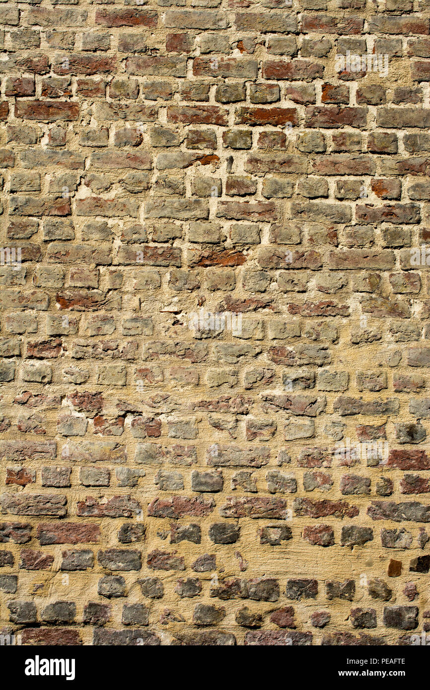 Old grunge brick wall as a background Stock Photo - Alamy