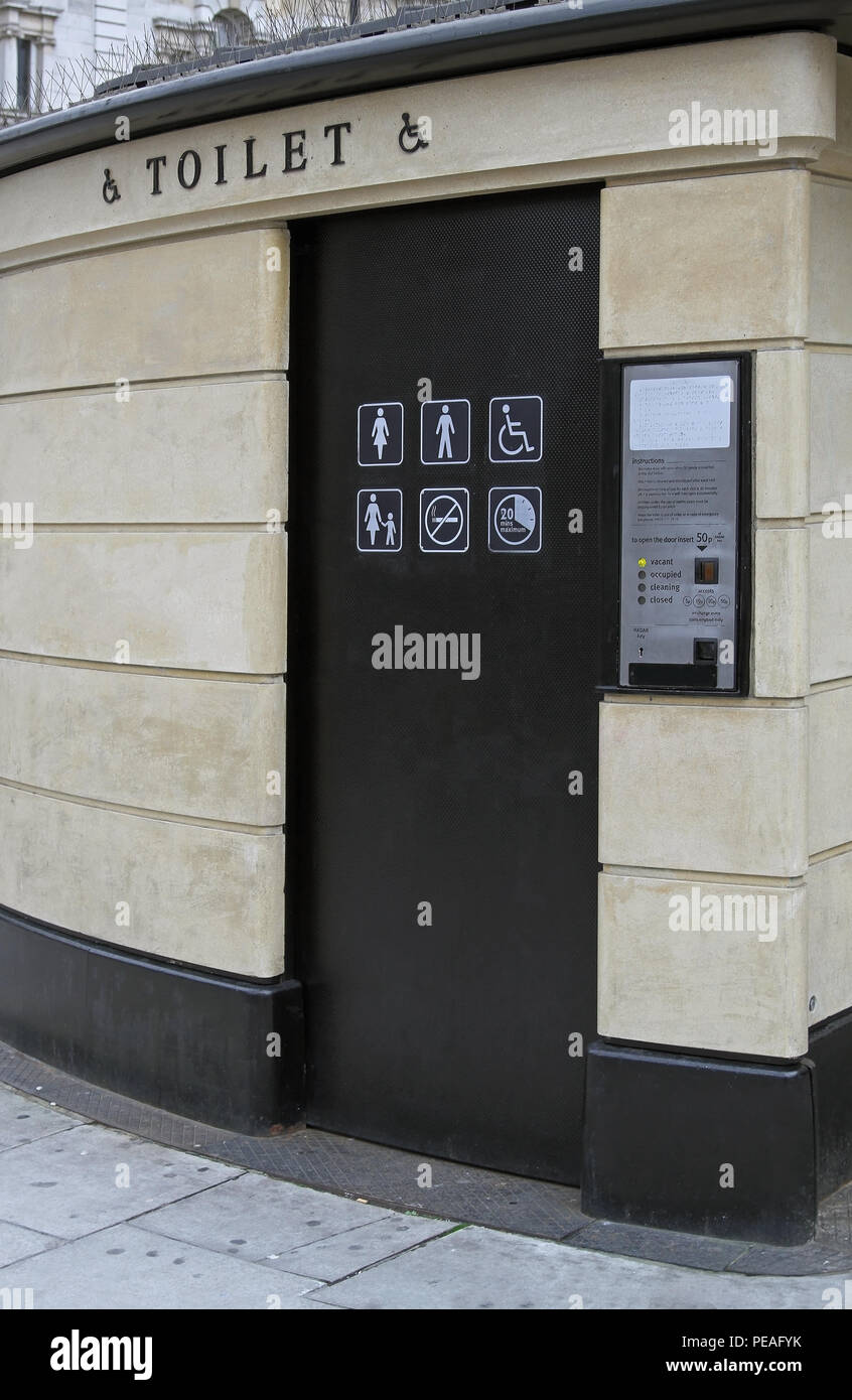 Automatic public toilet in London street operated by coins Stock Photo