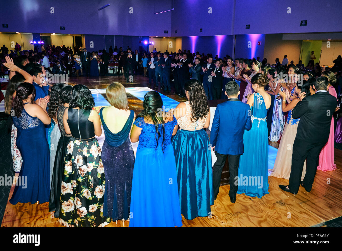 MERIDA, YUC/MEXICO - AUG 25, 2017: Portrait of young men and women at their university's graduating party Stock Photo