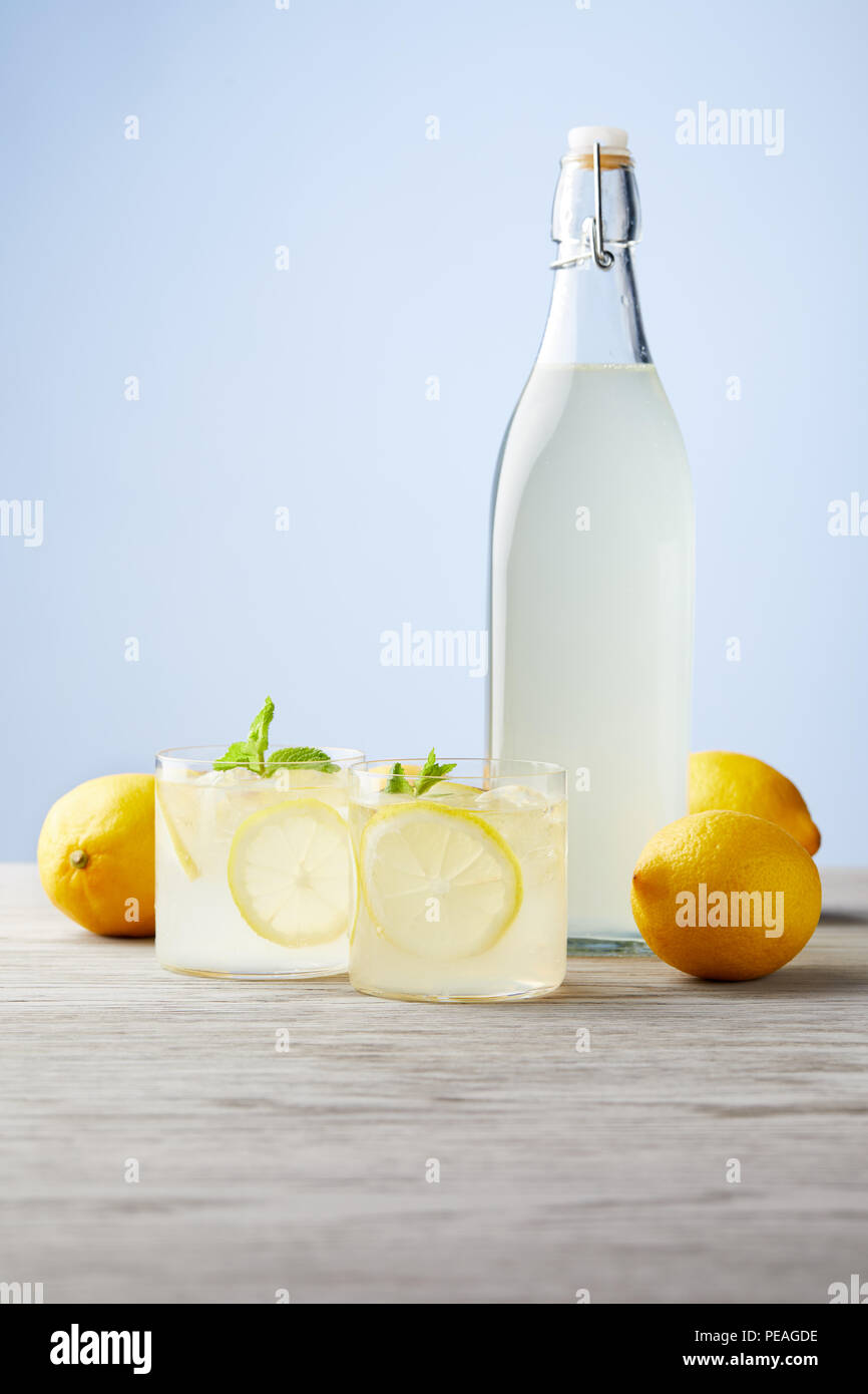 Limoncello in a carafe and two glasses … – License Images – 12574745 ❘  StockFood