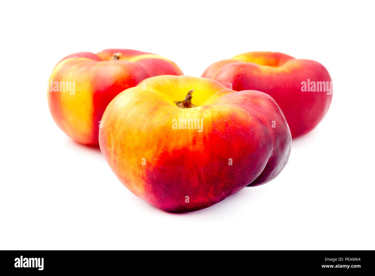 Saturn peaches on a white background Stock Photo