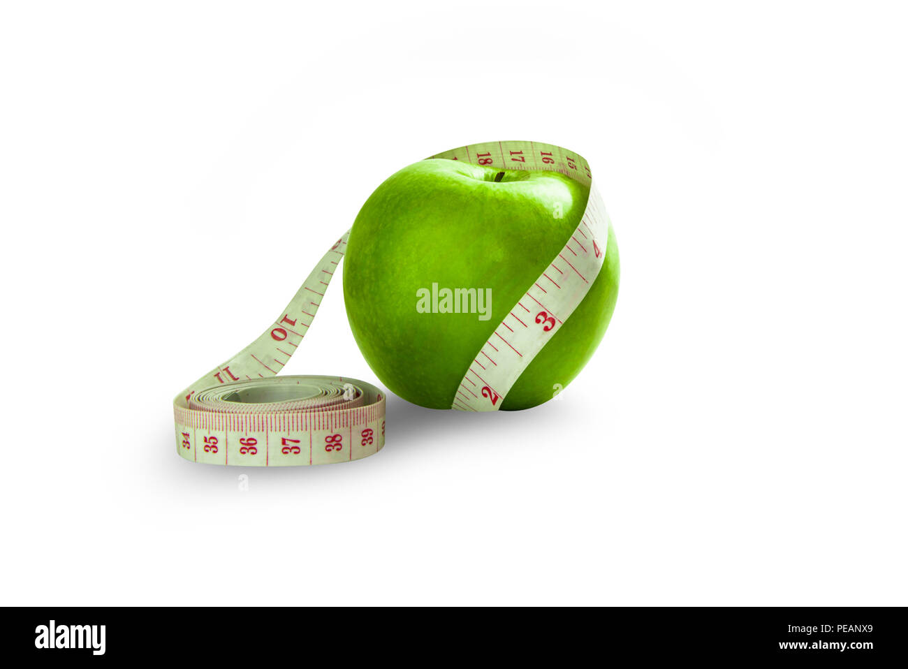 isolated green apple wrap around by measurment tape Stock Photo