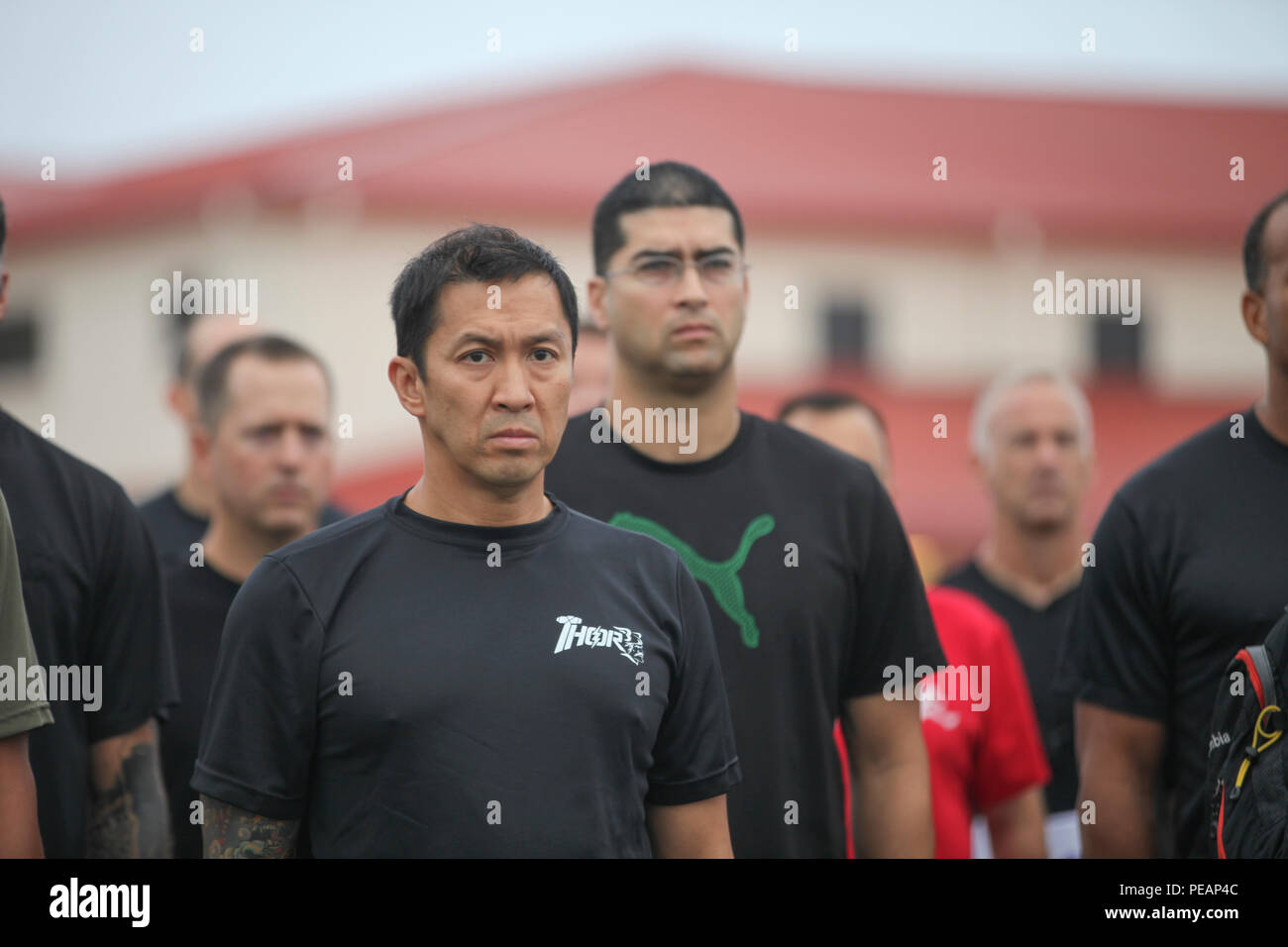 Participants and volunteers watch a memorial video during the opening ceremony for the 35th Annual Mattar Relay, MacDill Air Force Base, Tampa, Fla., Nov. 20, 2015. U.S. Lt. Col. George Mattar, a Citadel alumni and former Joint Communications Support Element (JCSE) commander, was killed on Jan. 13, 1982, when his flight, Florida Airlines No. 90, crashed into the waters of the Potomac River. Aboard this flight were 74 passengers, of which only six survived. Also killed were Maj. Ralph Herman, JCSE's Chief of Operations, and Sgt. Maj. James Dixon. In commemoration, JCSE sponsors an annual 14 mil Stock Photo