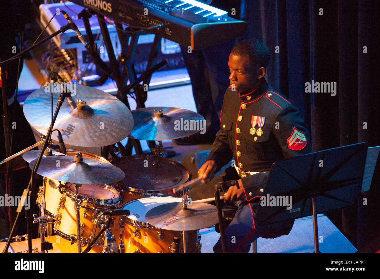 U.S. Marines Cpl. Randy West, Percussionist, with Marine Corps Band New Orleans performs for the celebration of the 240th Marine Corps Birthday Ball at Mardi Gras World, New Orleans, La., Nov. 21, 2015. This year’s celebration honors those past, present, and future Marines throughout history and marks the 240th Marine Corps Birthday since its founding on Nov. 10, 1775. (U.S. Marine Corps photo by Kimberly Aguirre/Released) Stock Photo