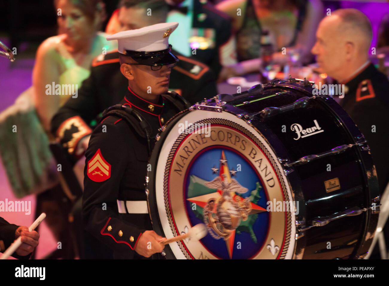 U.S. Marines Cpl. Estuarto Espinosa, Percussionist, with Marine Corps Band New Orleans performs for the celebration of the 240th Marine Corps Birthday Ball at Mardi Gras World, New Orleans, La., Nov. 21, 2015. This year’s celebration honors those past, present, and future Marines throughout history and marks the 240th Marine Corps Birthday since its founding on Nov. 10, 1775. (U.S. Marine Corps photo by Kimberly Aguirre/Released) Stock Photo
