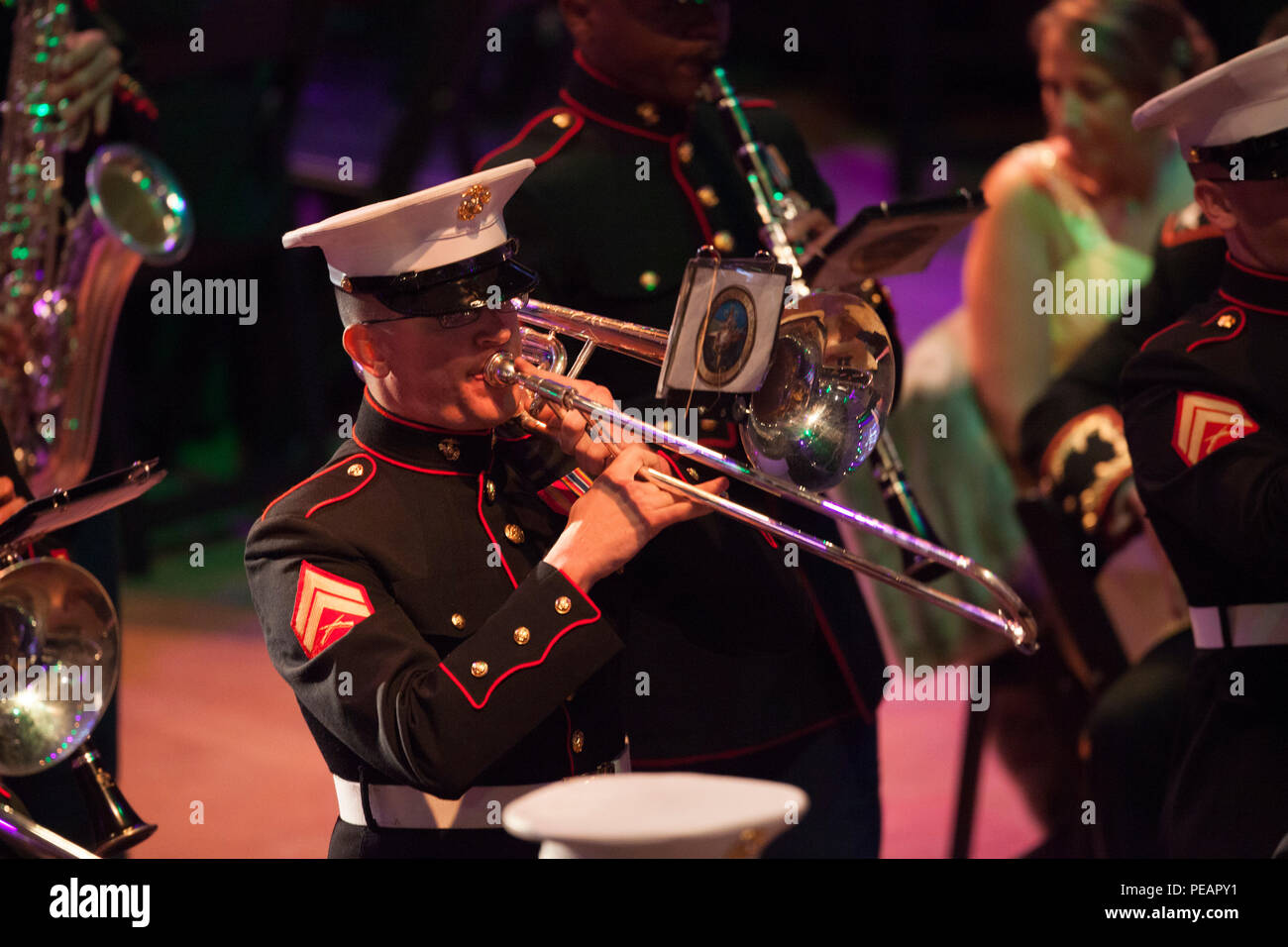 U.S. Marines Cpl. Nathan Scheffler, French Horn, with Marine Corps Band New Orleans performs for the celebration of the 240th Marine Corps Birthday Ball at Mardi Gras World, New Orleans, La., Nov. 21, 2015. This year’s celebration honors those past, present, and future Marines throughout history and marks the 240th Marine Corps Birthday since its founding on Nov. 10, 1775. (U.S. Marine Corps photo by Kimberly Aguirre/ Released) Stock Photo