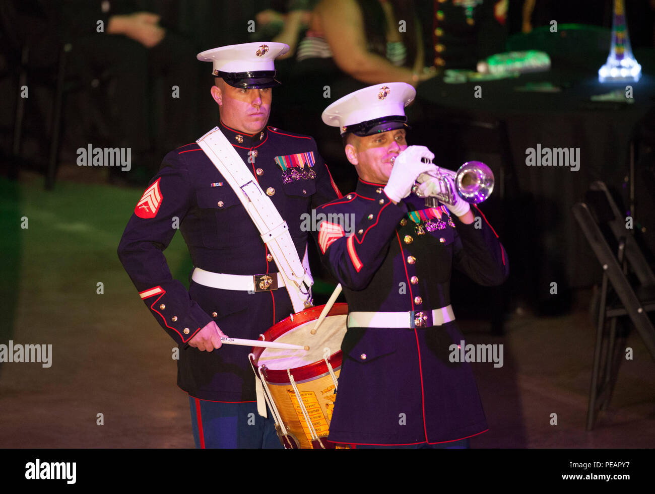 U.S. Marines Sgt. David Kelley (Left), and Sgt. Charles Mekealin (Right), with Marine Corps Band New Orleans perform for the celebration of the 240th Marine Corps Birthday Ball at Mardi Gras World, New Orleans, La., Nov. 21, 2015. This year’s celebration honors those past, present, and future Marines throughout history and marks the 240th Marine Corps Birthday since its founding on Nov. 10, 1775. (U.S. Marine Corps photo by Kimberly Aguirre/Released) Stock Photo