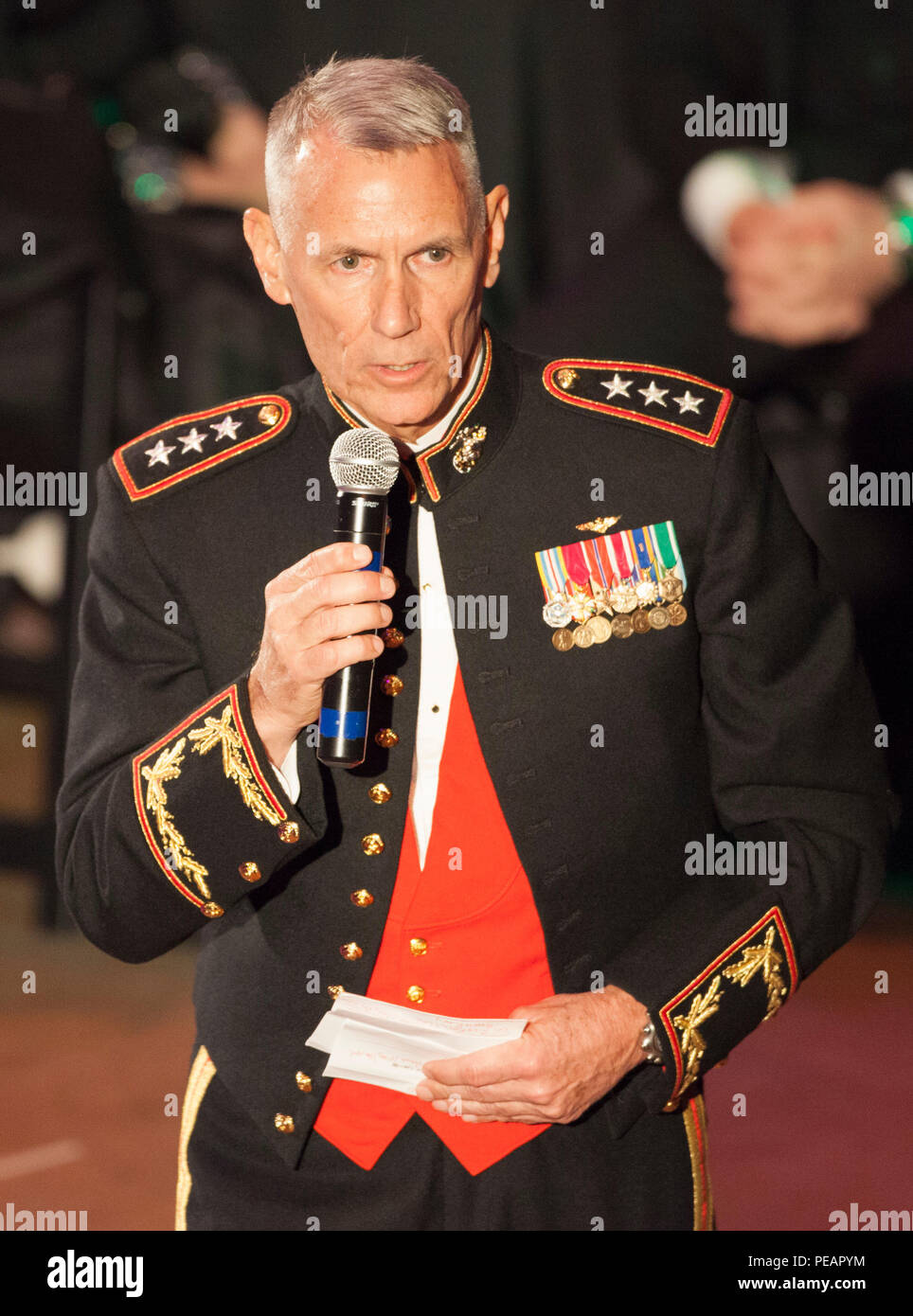 U.S. Marine Lt. Gen. Rex C. McMillian, Commander of Marine Forces Reserve and Marine Forces North, gives a speech during the celebration of the 240th U.S. Marine Corps Birthday Ball at Mardi Gras World, New Orleans, La., Nov. 21, 2015. This year’s celebration honors those past, present, and future Marines throughout history and marks the 240th Marine Corps Birthday since its founding on Nov. 10, 1775. (U.S. Marine Corps photo by Kimberly Aguirre/Released) Stock Photo