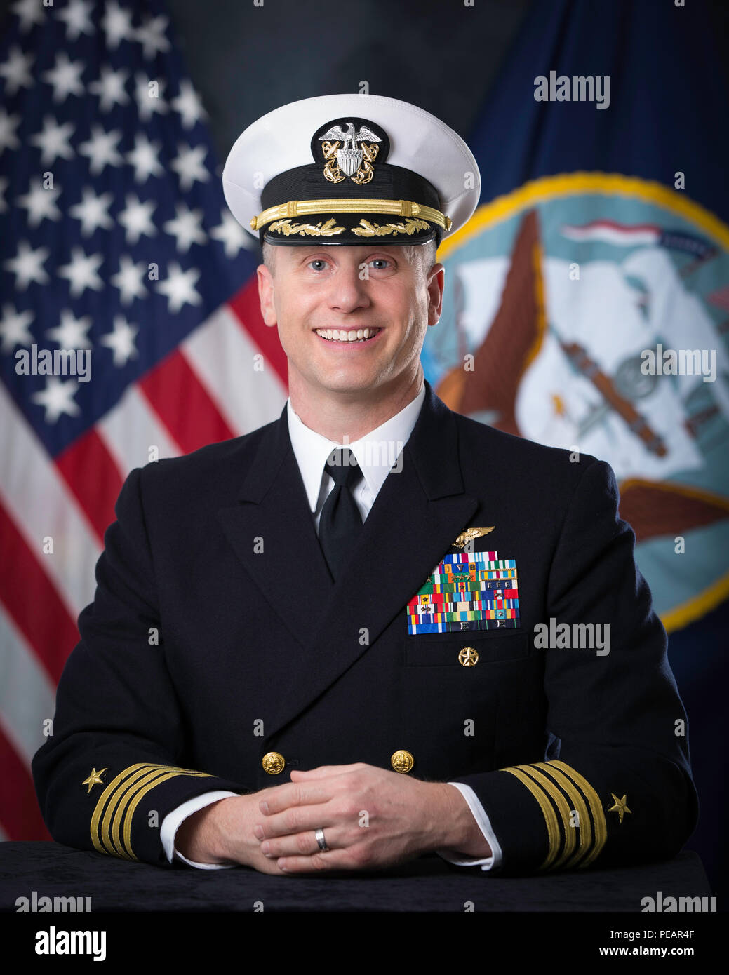 Official portrait, covered, of Commander, Fleet Activities Okinawa ...