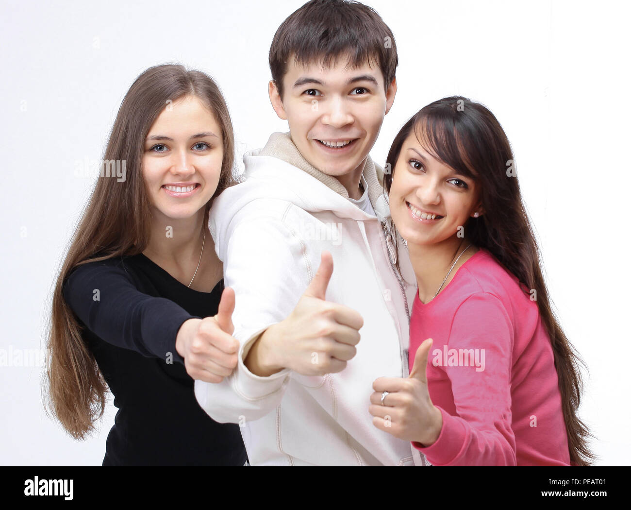 group of successful young people showing thumb up Stock Photo - Alamy