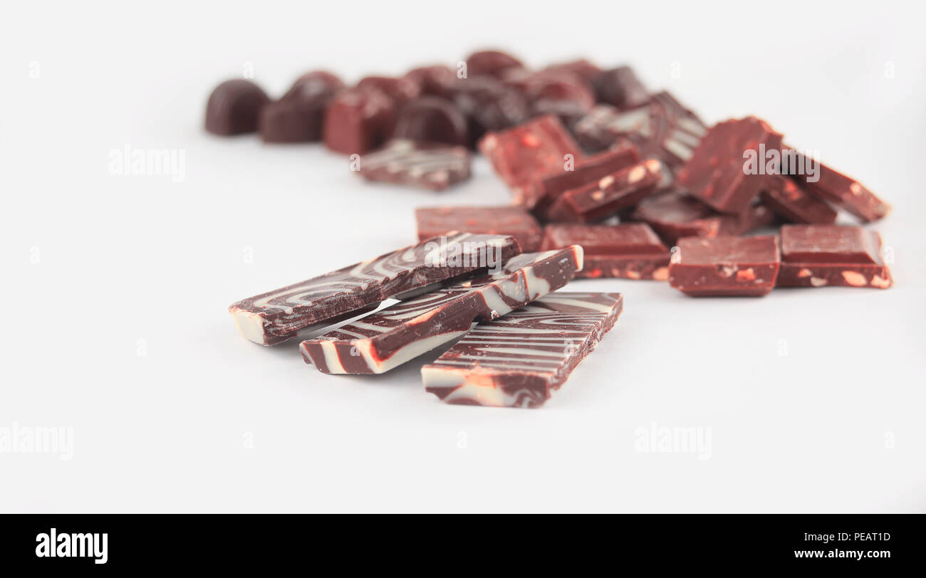 close up.a set of chocolate bars and sweets. isolated on white.p Stock Photo