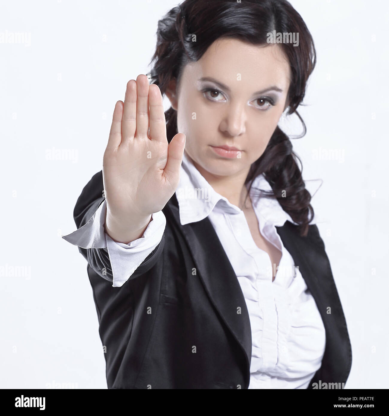 Business woman making stop sign isolated over white Stock Photo Alamy