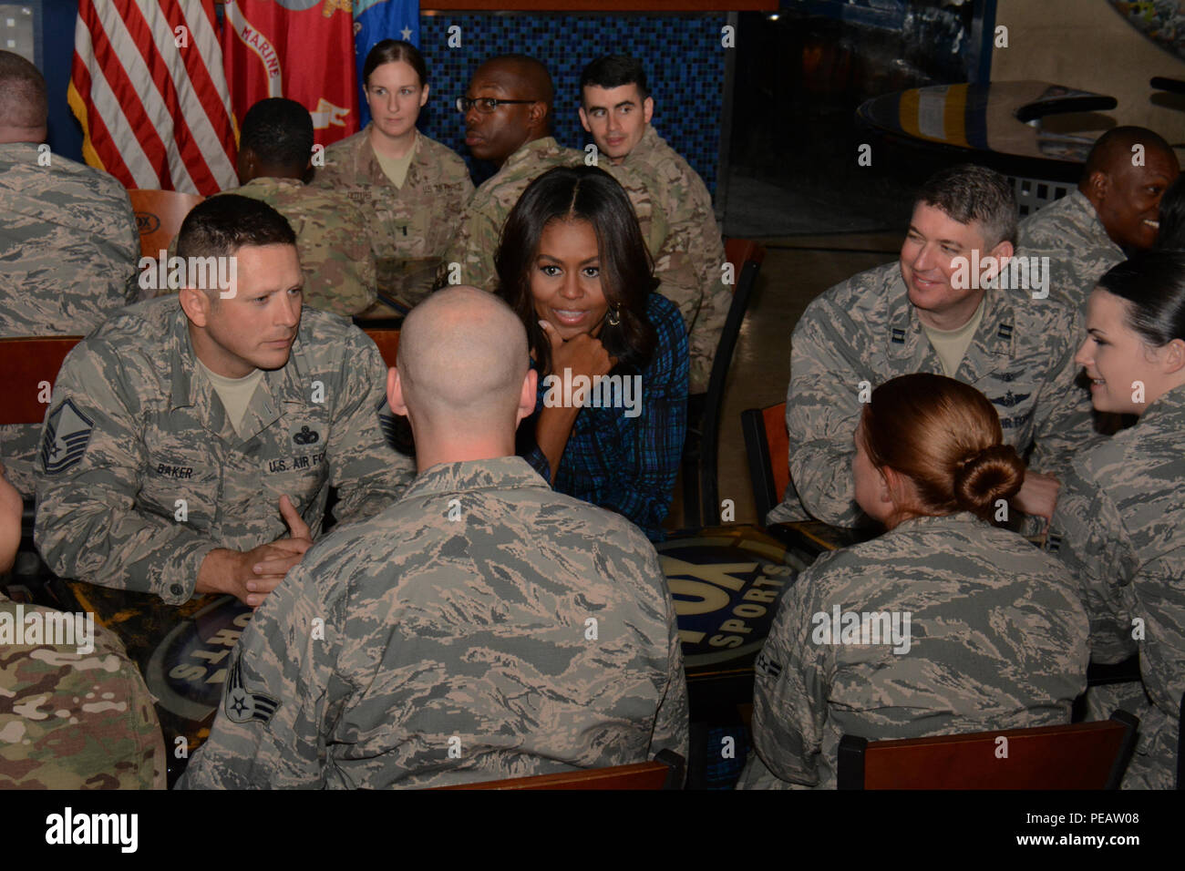 The First Lady of the United States Michelle Obama meets with service  members inside the Fox Sky Box at Al Udeid Air Base, Qatar, Nov. 3. Obama  said she is very proud