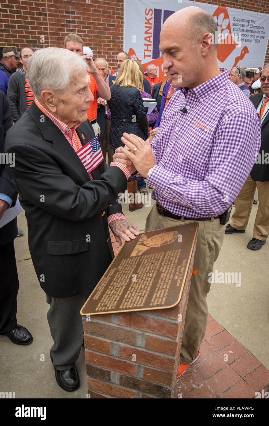 Clemson University President James Clements shares a moment with Bataan
