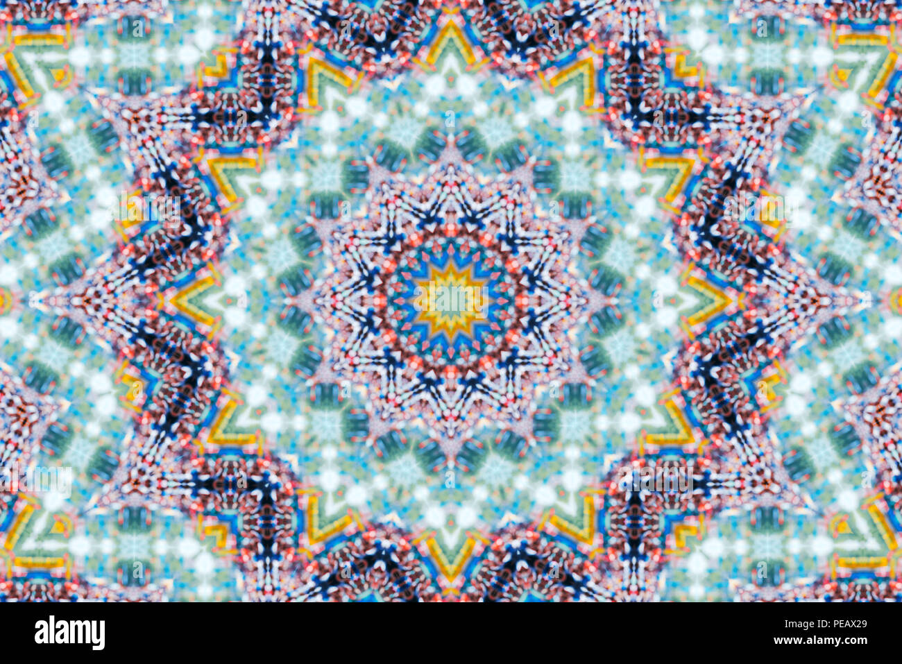 Psychedelic kaleidoscopic illusive symmetrical pattern as background Stock Photo