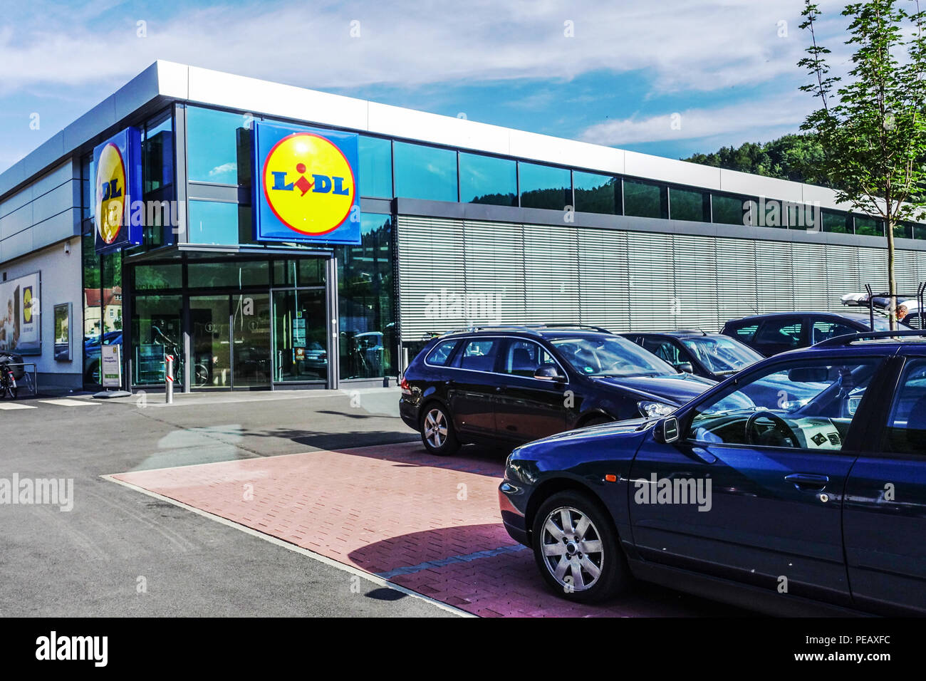 Lidl Supermarket Germany Parking place Cars Lidl car park, Lidl supermarket Lidl store Car park Lidl logo Store Shop, Outside Suburb Discount Company Stock Photo