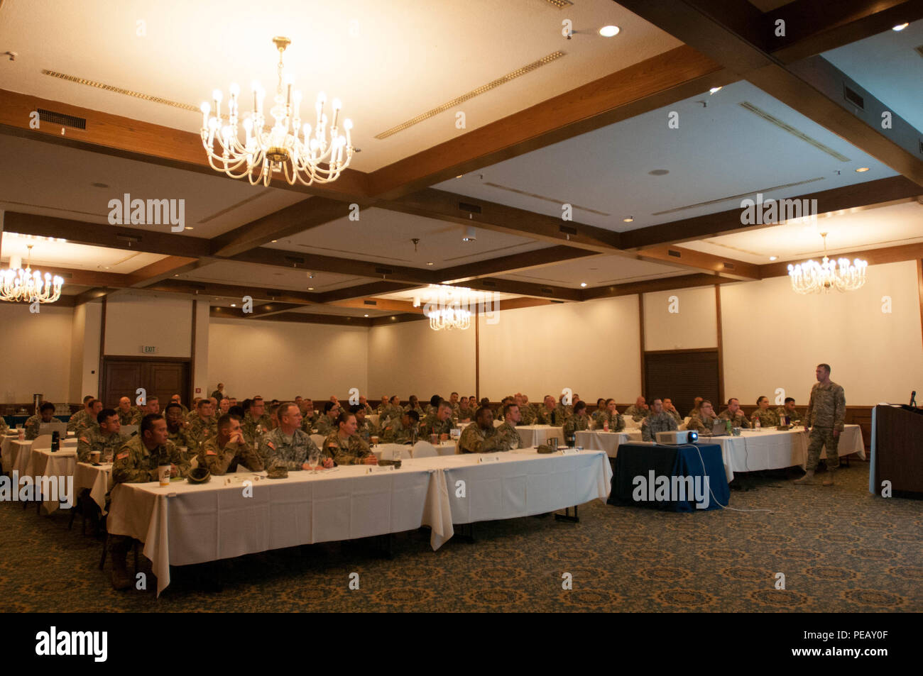 Lt. Col. Matthew Mapes, 30th Medical Brigade S3, leads a discussion on