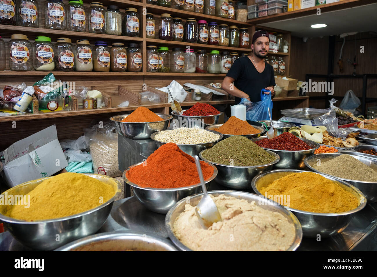 A spice seller in Machane Yehuda market in Jewish west Jerusalem. From a series of travel photos taken in Jerusalem and nearby areas. Photo date: Mond Stock Photo