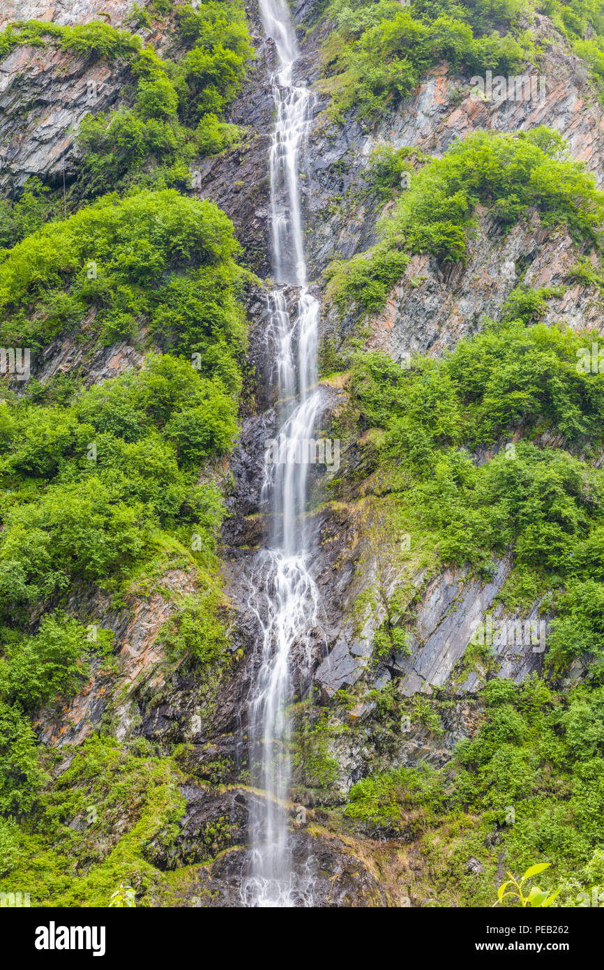 Tall thin waterfalls in Keystone Canyon on the Richardson Highway in Valdez Alaska Stock Photo