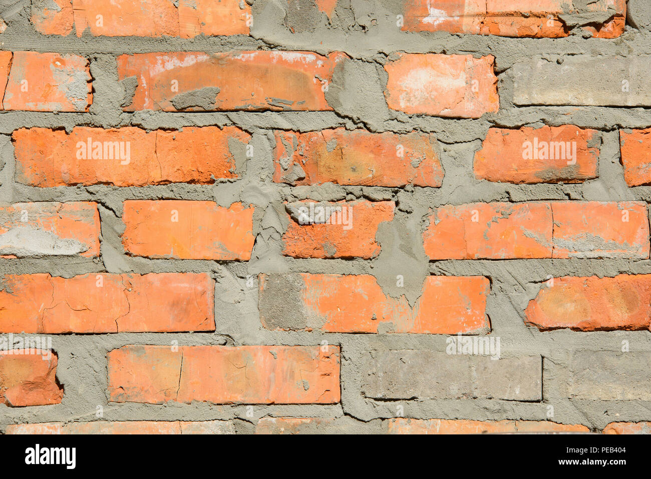 full frame image of brick wall with cement background Stock Photo - Alamy