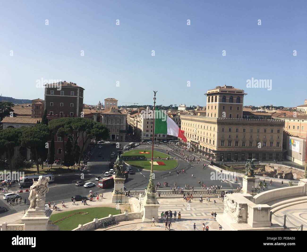 Rome, Rome, China. 14th Aug, 2018. Piazza Venezia is the central hub of Rome, Italy, in which several thoroughfares intersect, including the Via dei Fori Imperiali and the Via del Corso. It takes its name from the Palazzo Venezia, built by the Venetian Cardinal, Pietro Barbo (later Pope Paul II) alongside the church of Saint Mark, the patron saint of Venice. The Palazzo Venezia served as the embassy of the Republic of Venice in Rome. Credit: SIPA Asia/ZUMA Wire/Alamy Live News Stock Photo