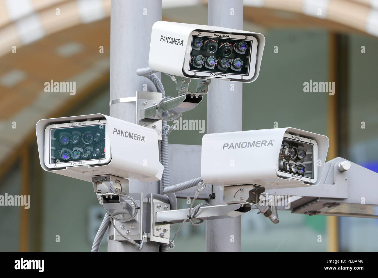 14 August 2018, Chemnitz, Germany: Surveillance cameras hang in front of the city hall. The city of Chemnitz wants to prevent crime in the city centre by video surveillance from September onwards. As part of the controversial measure, a total of 38 cameras will cover numerous areas of the centre. Photo: Jan Woitas/dpa-Zentralbild/dpa Stock Photo