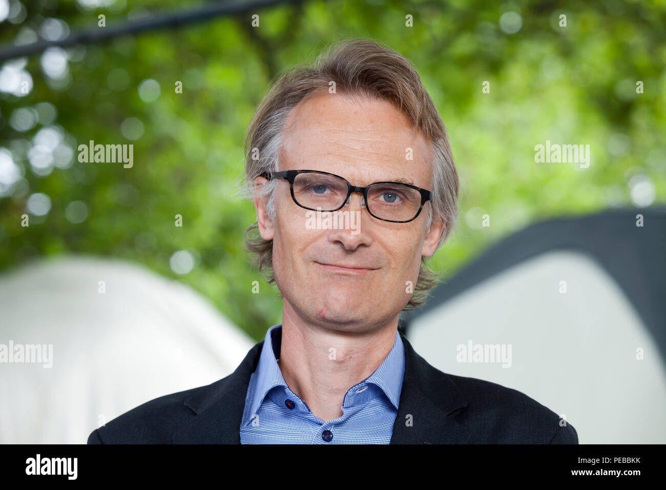 Edinburgh, UK. 14th August, 2018. Richard Lloyd Parry, the British foreign correspondent and writer. He is the Asia Editor of The Times of London, based in Tokyo, and is the author of non-fiction books. Pictured at the Edinburgh International Book Festival. Edinburgh, Scotland.  Picture by Gary Doak / Alamy Live News Stock Photo