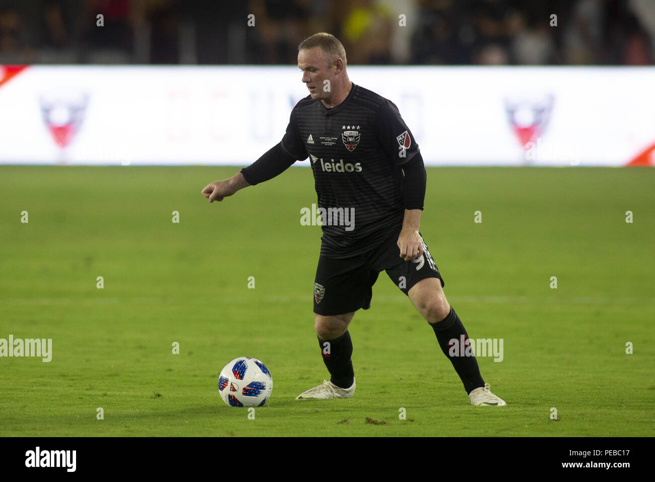 Washington, District of Columbia, USA. 14th July, 2018. D.C. United forward Wayne Rooney (9) dribbles during the game between D.C. United and Vancouver Whitecaps at Audi Filed in Washington, DC on July 14, 2018. D.C. This is D.C. United's first game at Audi Field. Credit: Alex Edelman/ZUMA Wire/Alamy Live News Stock Photo